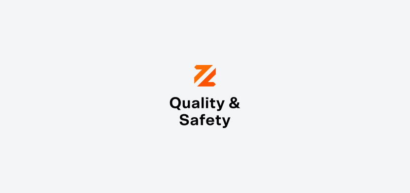Quality & Safety vertical logo on a light gray backgroundd